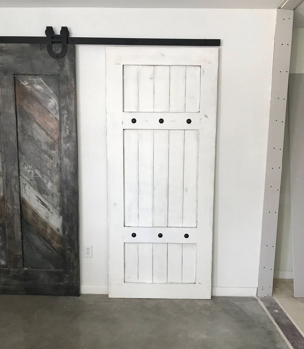 Custom Farmhouse Plank Barn Door with Clavos